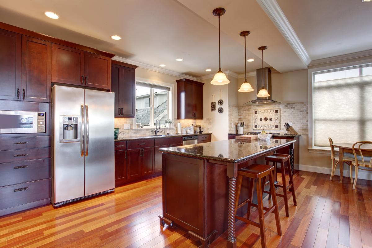 Transforming Your Kitchen: Top Considerations for Painting or Staining Cabinets