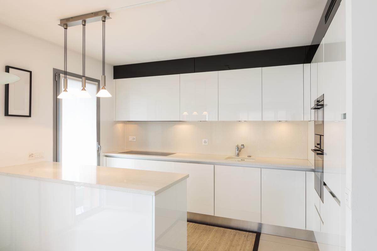A Peninsula Kitchen Gives Way to More Storage Space