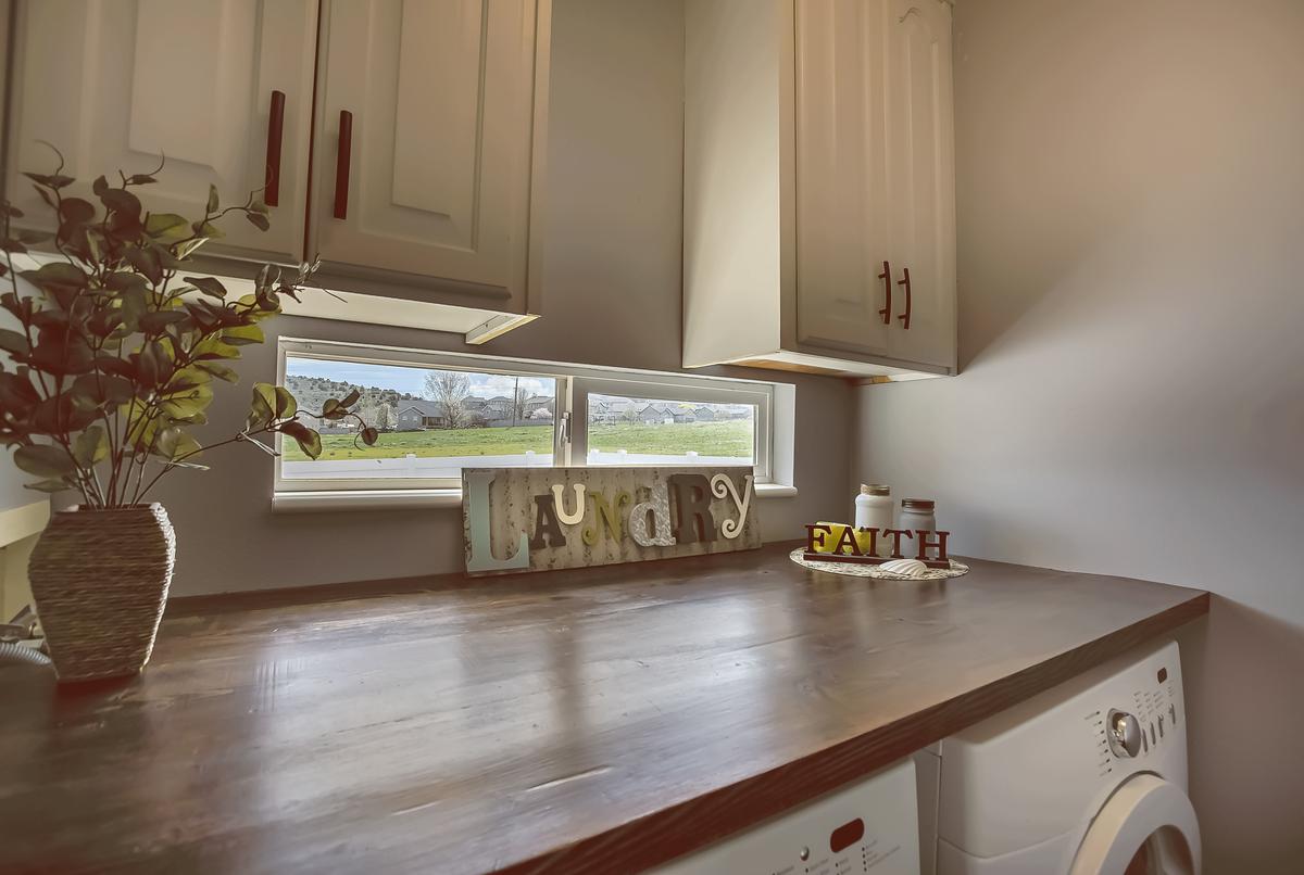Add Style and Practicality to Your Laundry Room With a Wooden Countertop