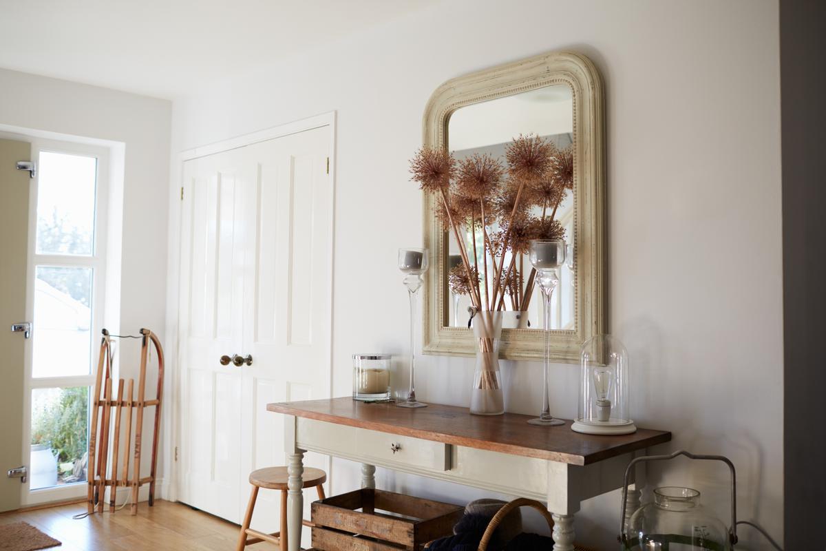 Achieve an authentic look in your entryway with a country-chic console table.