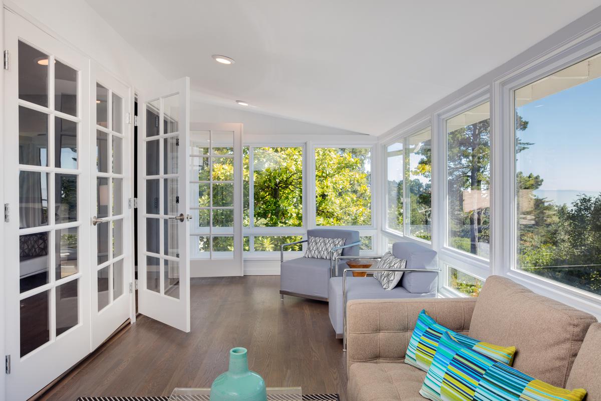 The solid choice of concrete slabs ensures durability, while sturdy footings like poured concrete, cinder blocks, or pressure-treated lumber provide a reliable foundation for your sunroom conversion.