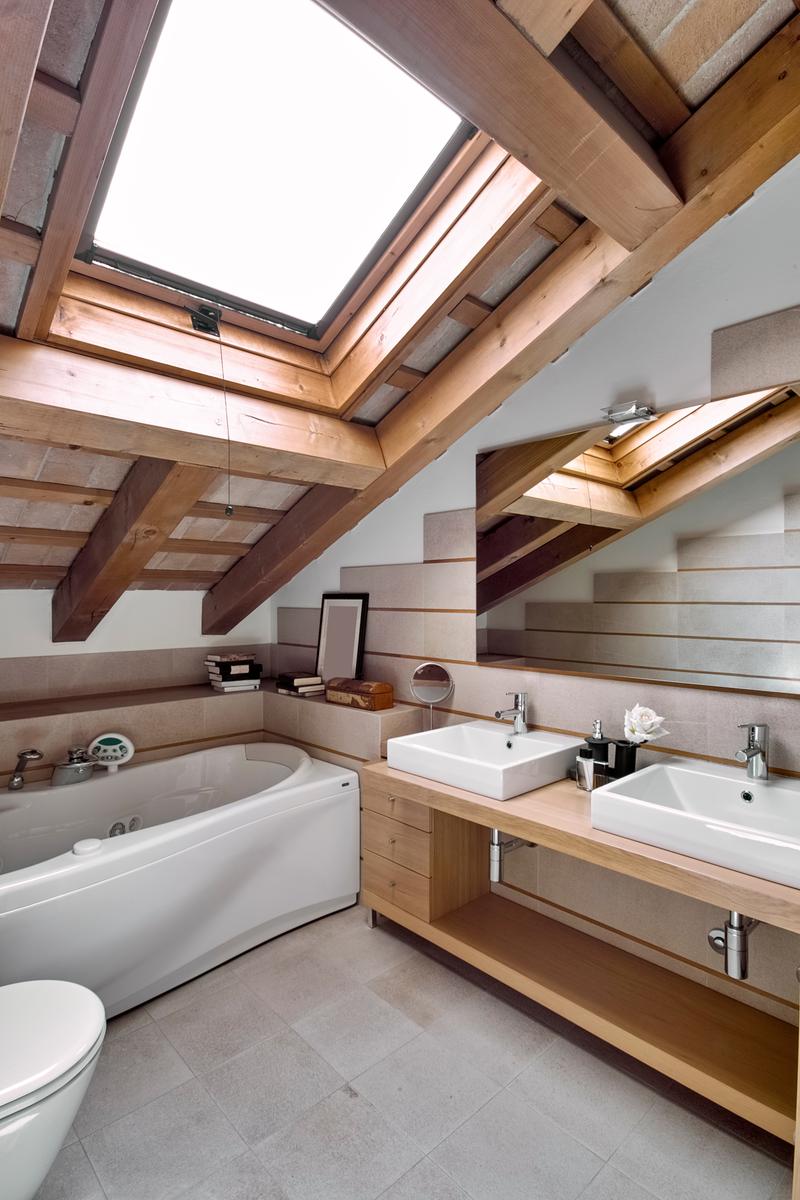 Brighten the mood in your small bathroom with plenty of natural light thanks to a large skylight.