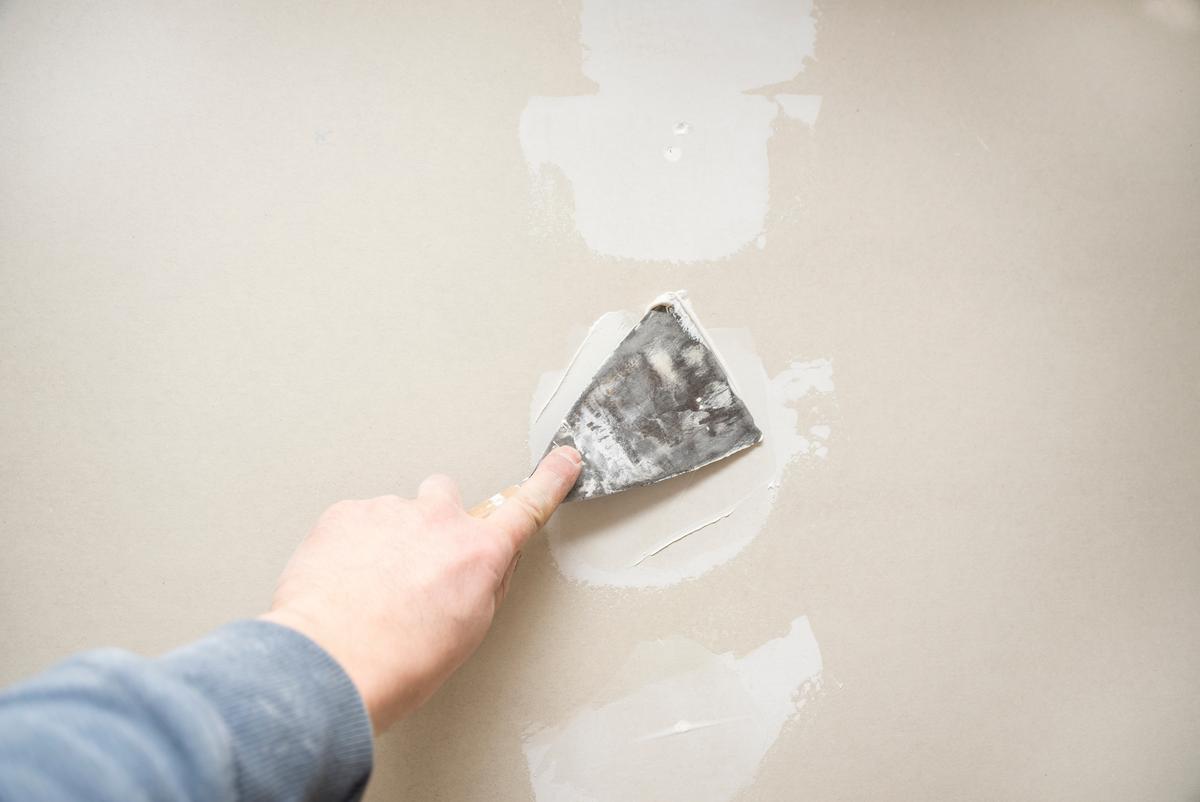 Not all hole repairs require cutting out drywall.