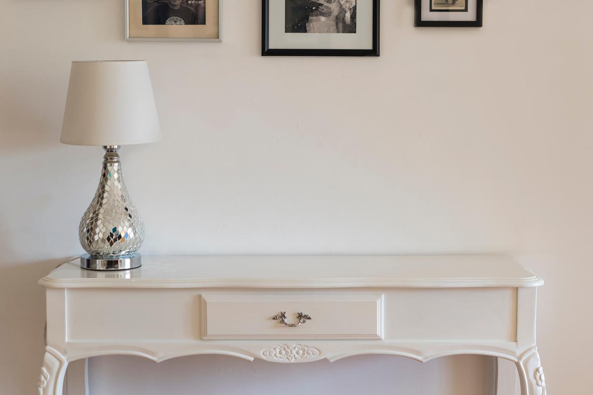 Boudoir-style foyer tables can tastefully evoke a 19th-century vibe in your entryway.