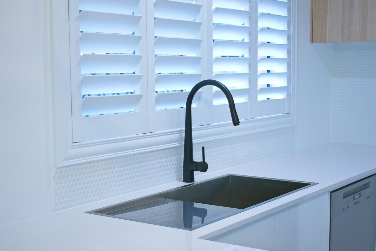 Window treatments come in a variety of sleek designs, allowing you to create a high-end look in your kitchen.