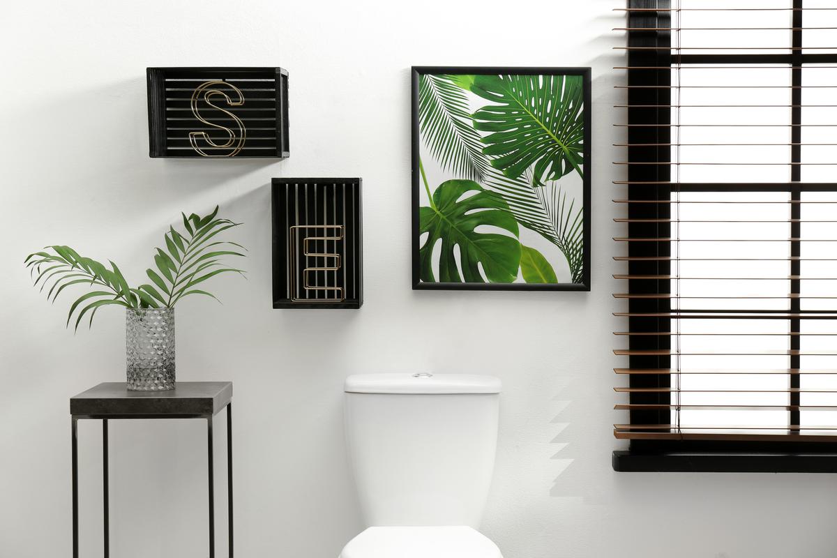 Convert your small bathroom into a unique art gallery.
