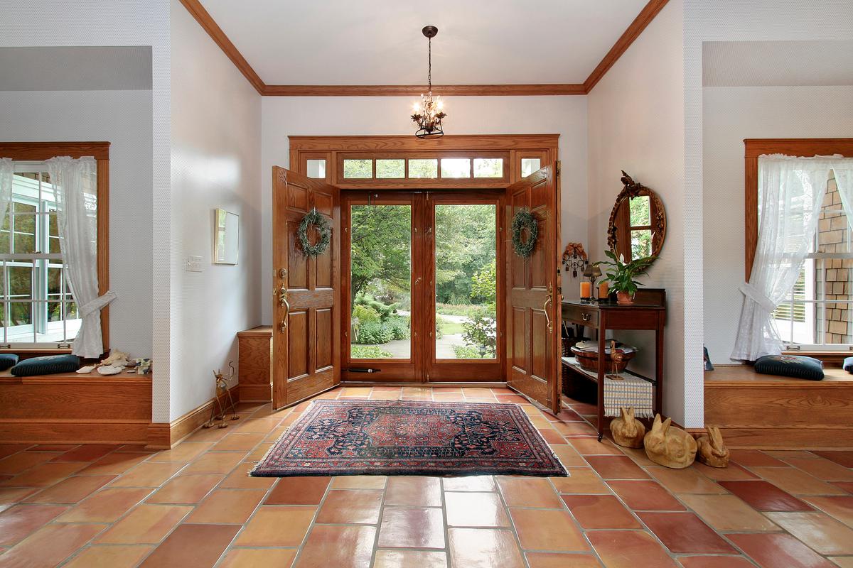 Give your entryway a Mediterranean twist with terracotta-style porcelain tiling.