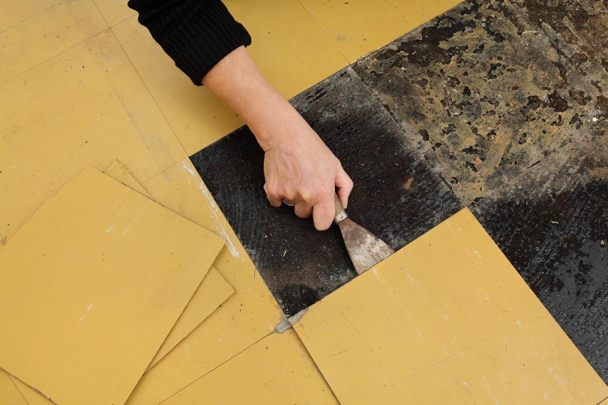 Vinyl flooring can be inconvenient to remove, but wouldn’t require a professional to do it either.