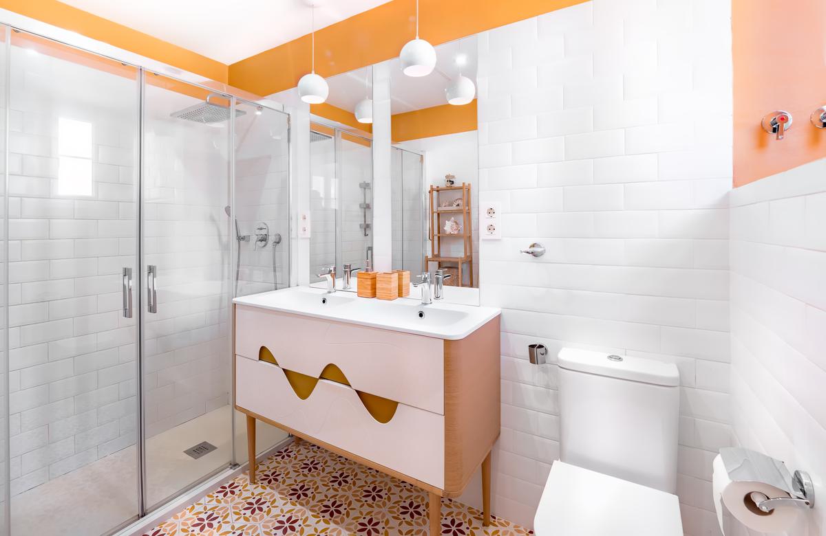 Keep things trendy with colorful design accents in your water closet.