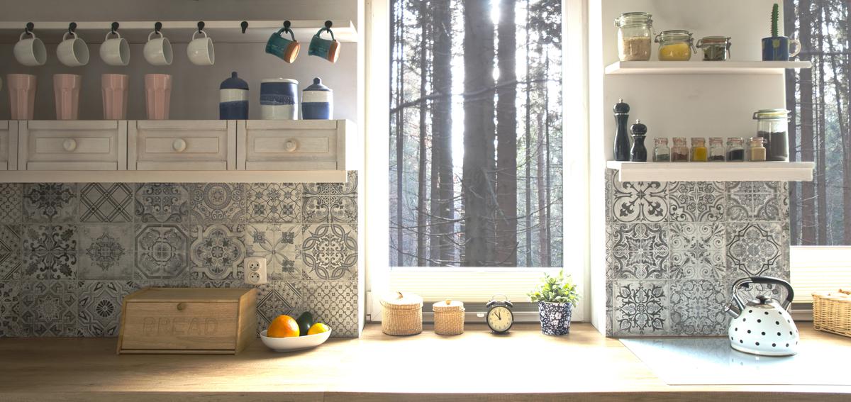 A tile backsplash is a great way to make a statement in the kitchen without cluttering or overcrowding the space.