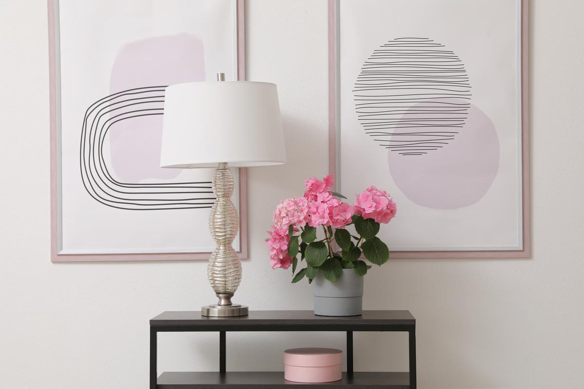 Accessorize your entryway console with a chic table lamp.
