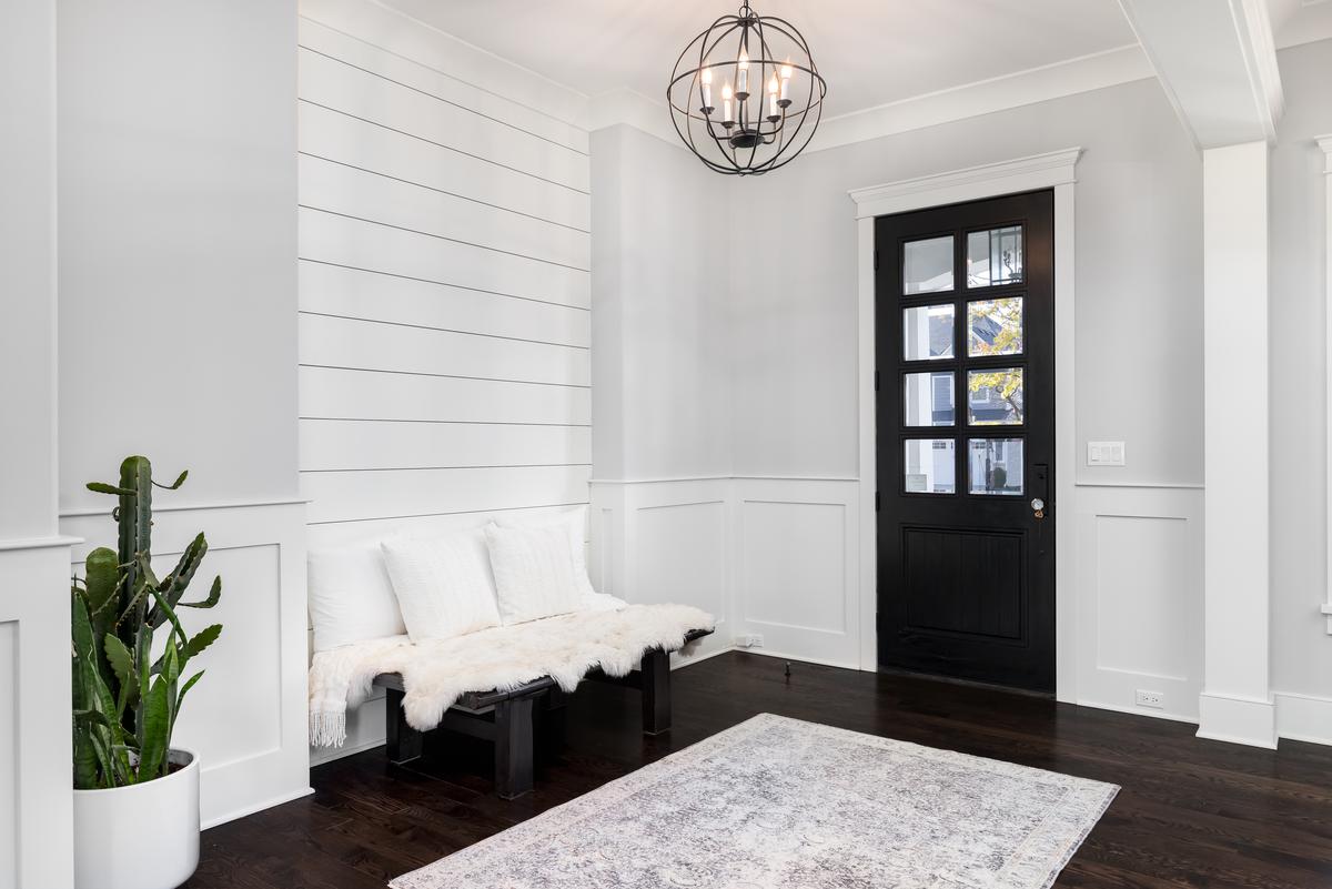 Pale lightness can serve as a classy and calm choice for foyers.