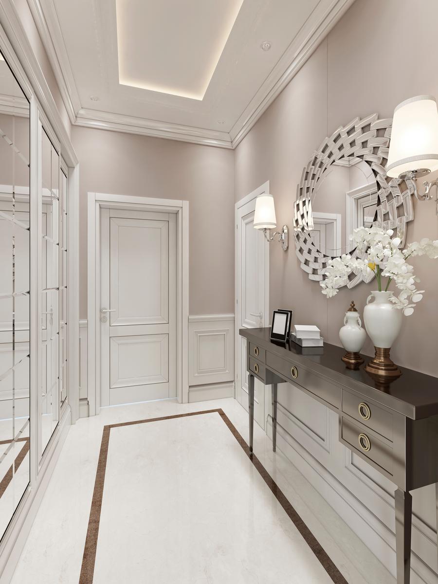 Art Deco console tables are characterized by geometric lines and reflective surfaces.