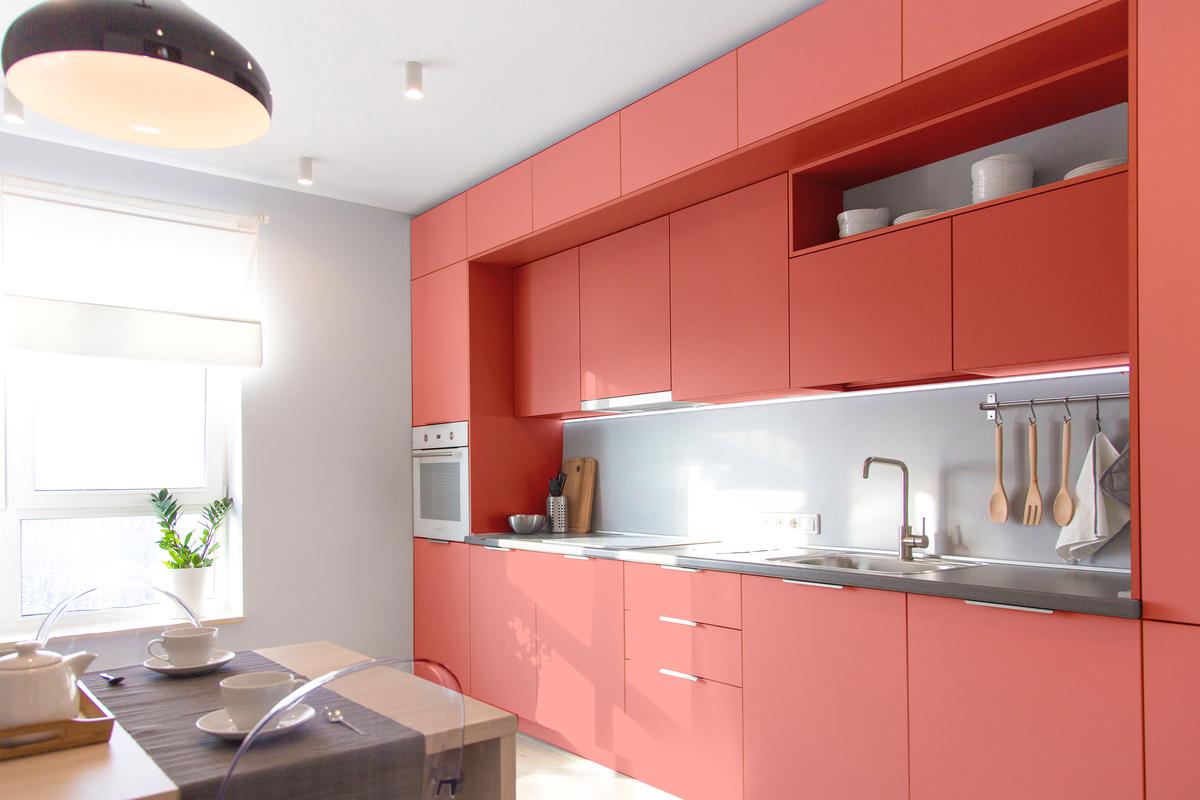 Adopt fun, coral kitchens for a more playful interior.