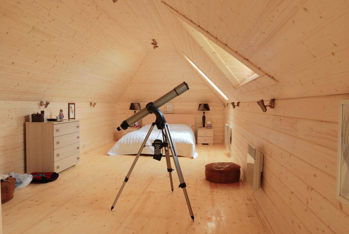 An Attic With a Skylight Can Make for an Ideal Stargazing Room