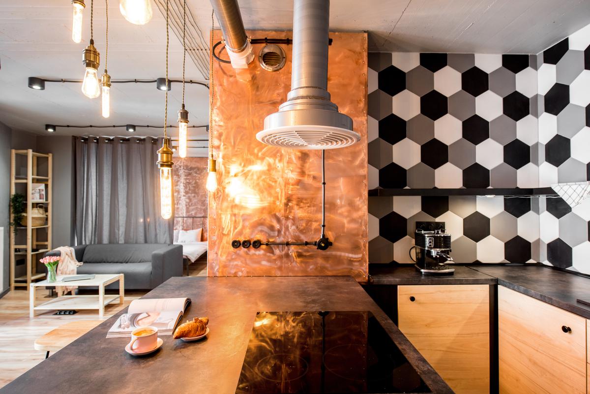 Copper, iron, and steel are perfect for a rustic kitchen.