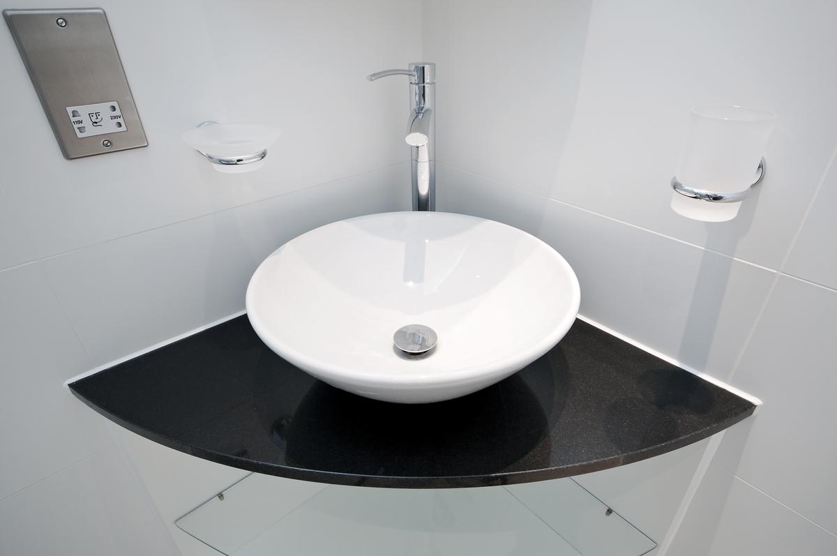 Corner sinks can be ideal for bathrooms where space is an issue.