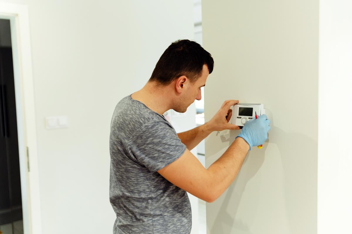 Overcoming C wire challenges in older HVAC systems: DIY solutions and the importance of professional guidance.