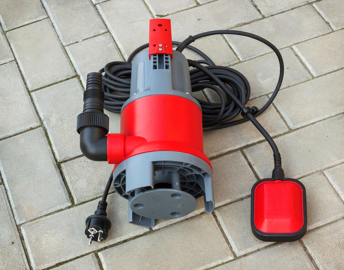 A submersible sump pump quietly operates underwater, protecting your home from water damage.