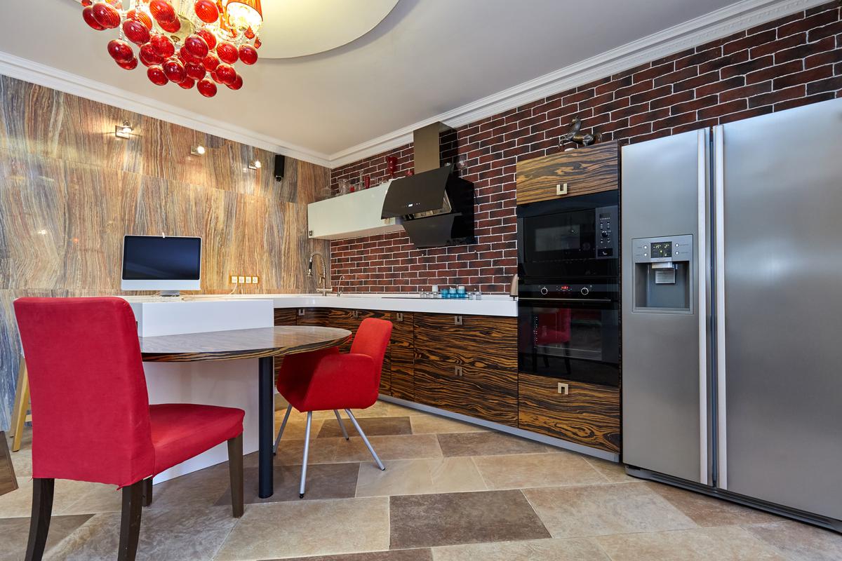 Flagstone tiles in kitchens are “going big” this year.