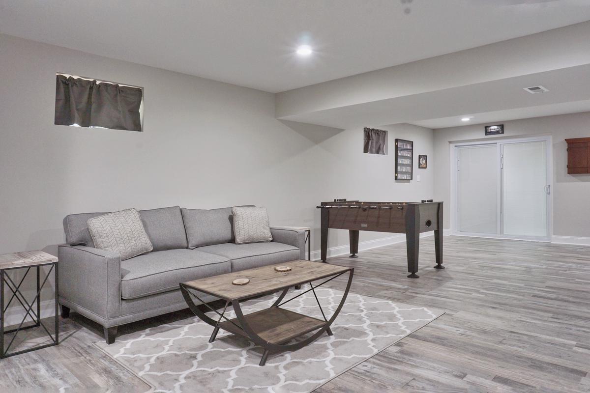 Elevating basement allure: Discover the perfect foundation as the right flooring choice transforms the basement into a stylish and inviting space