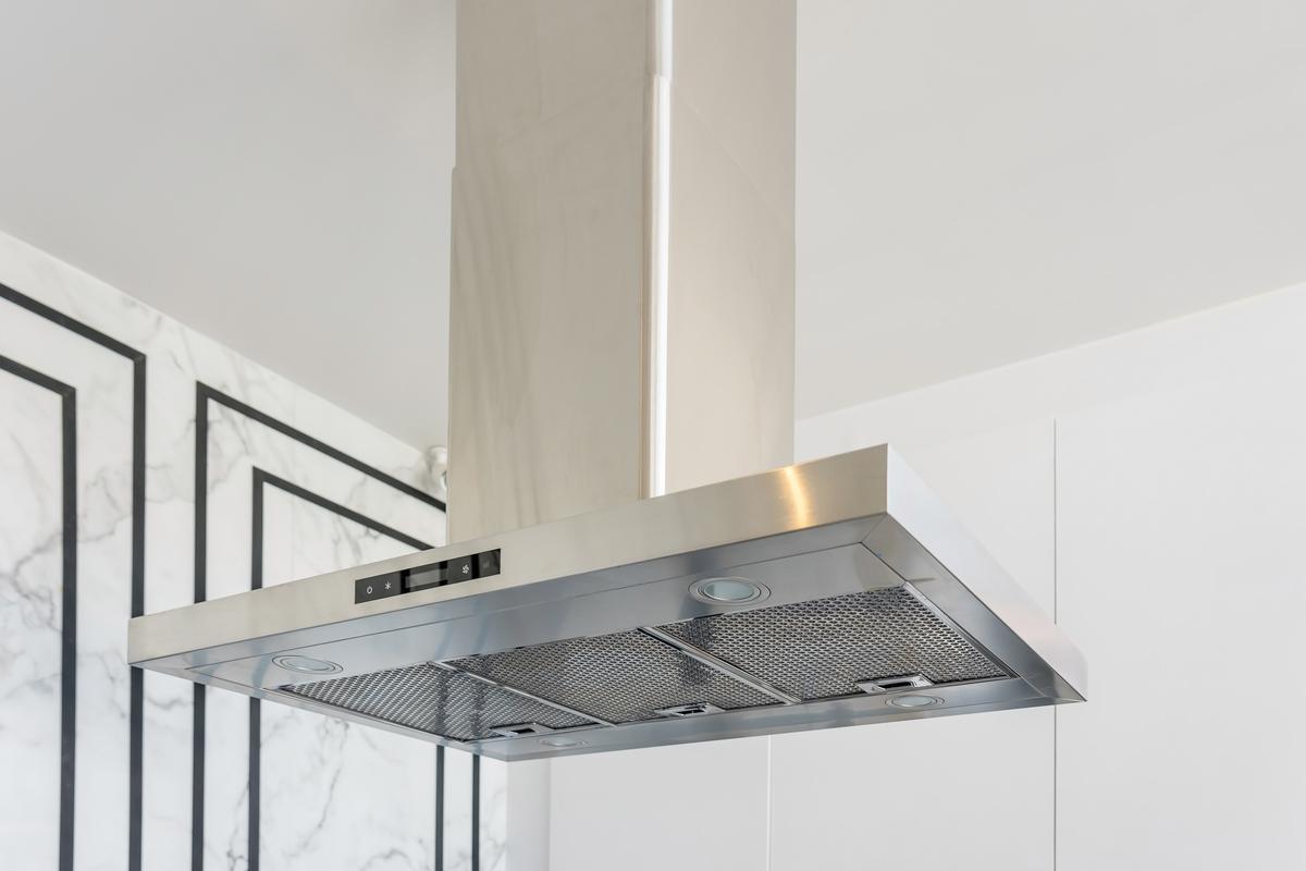 Install a Modern Stainless Steel Kitchen Hood That’s Easy to Clean and Maintain