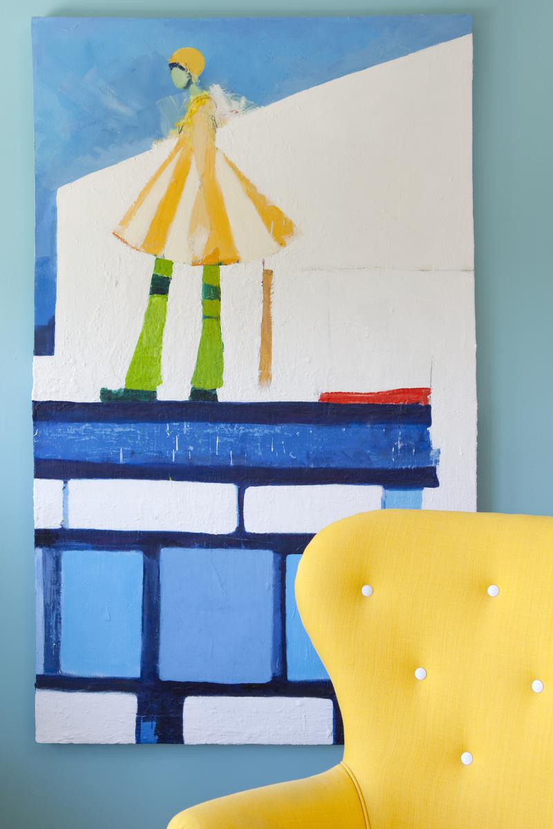 Laurel’s selection of lively paintings tastefully resonates with the interior design of her cottage.