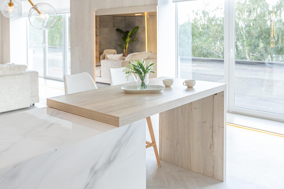 Minimal decorative items greatly reduce the time needed to keep flat surfaces such as counters and tables clean.