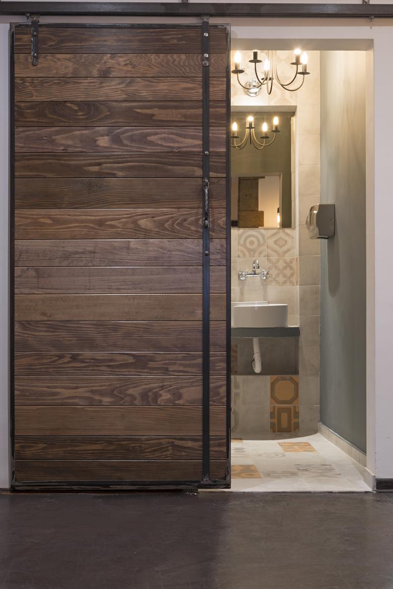 Nothing Says Farmhouse More than A Sliding Door Bathroom