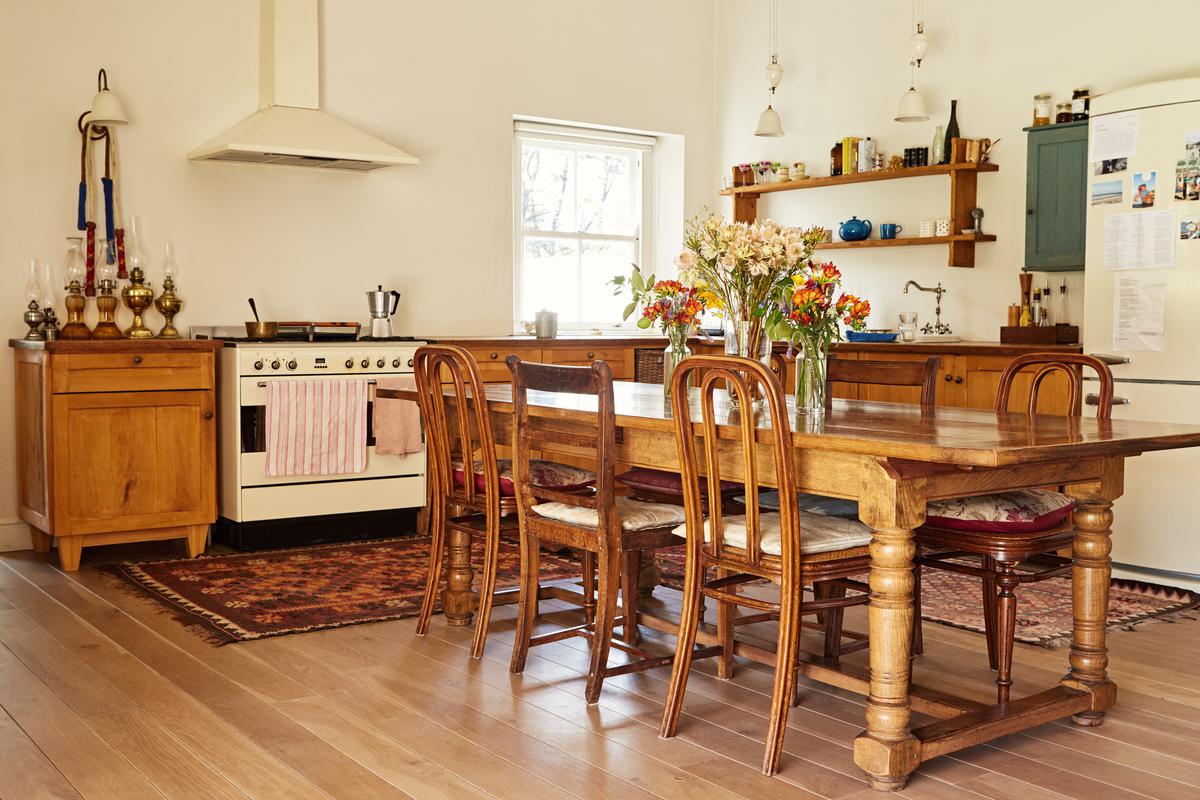 One of the Best Ways to Design a Modern Farmhouse Kitchen Is to Forgo Uniformity