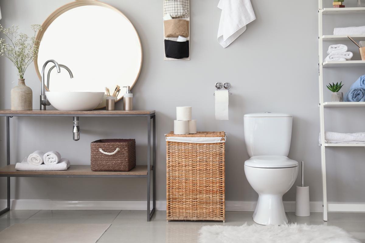 An open-shelves style bathroom vanity helps make your small bathroom feel more roomy.