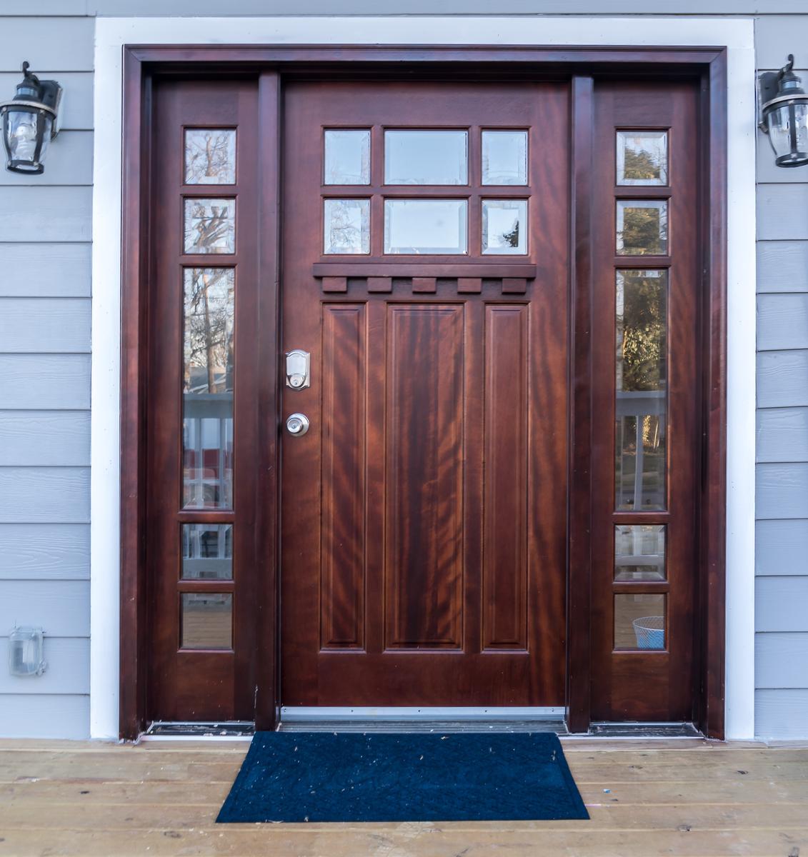 Opting for Classic Wood Means Your Entry Is Sturdy, Chic, and Well Insulated