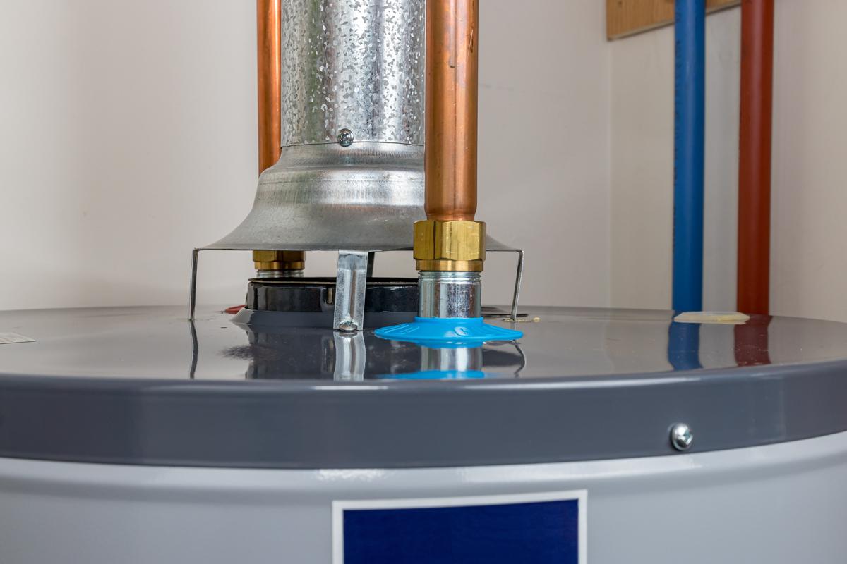 The copper pipe assemblies must be installed before you can connect the replacement water heater to the water mains.