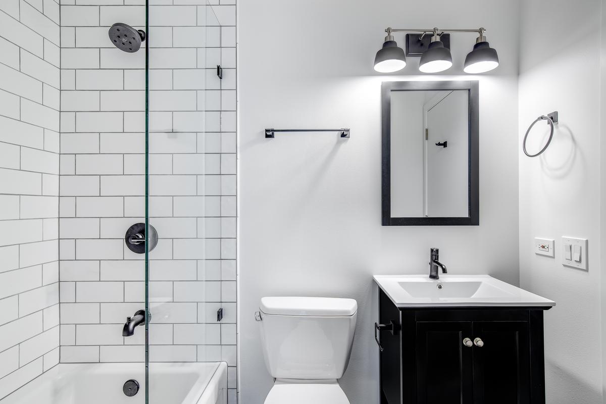 The neutral colors of the modern-minimalist Scandi-style make for a very distinct bathroom vanity.