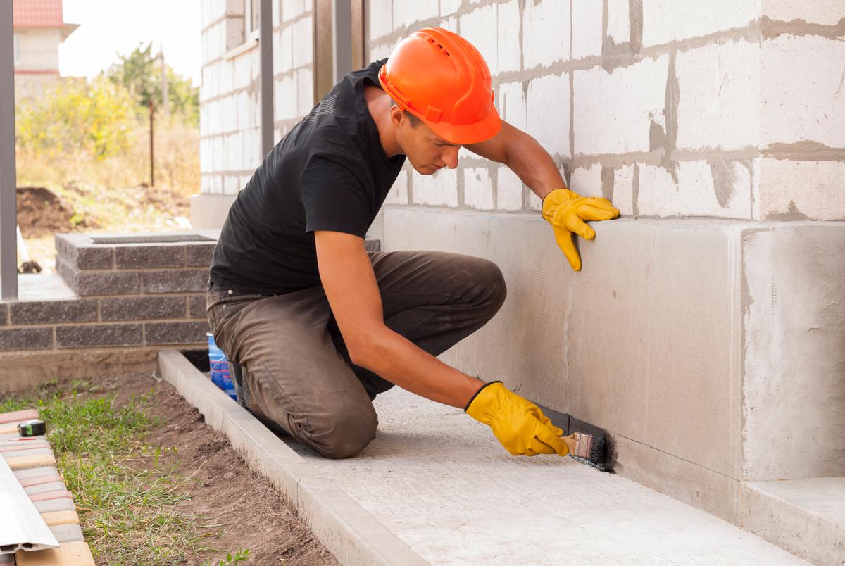 Building a Solid Base: The Key to a Durable Brick or Stone Wall.