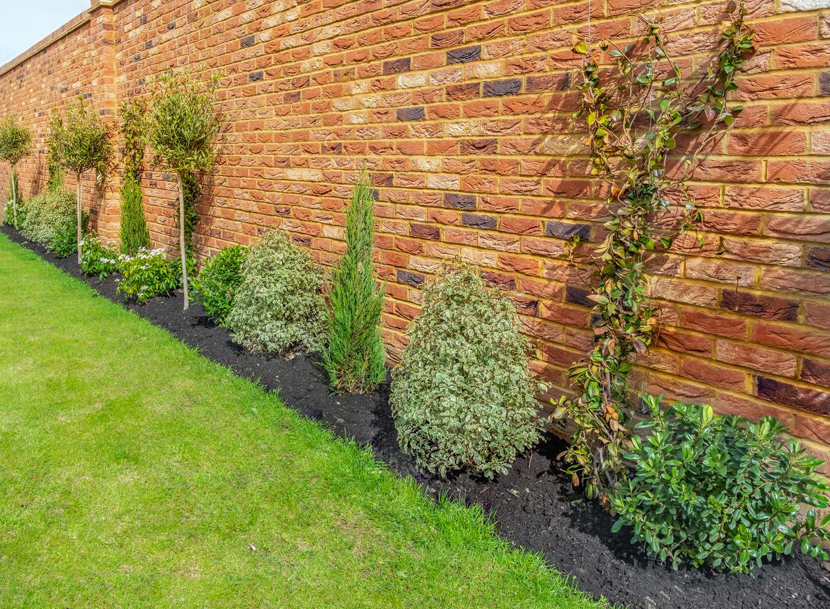 Strong and Durable Brick Walls Make For Great Backyard Barriers