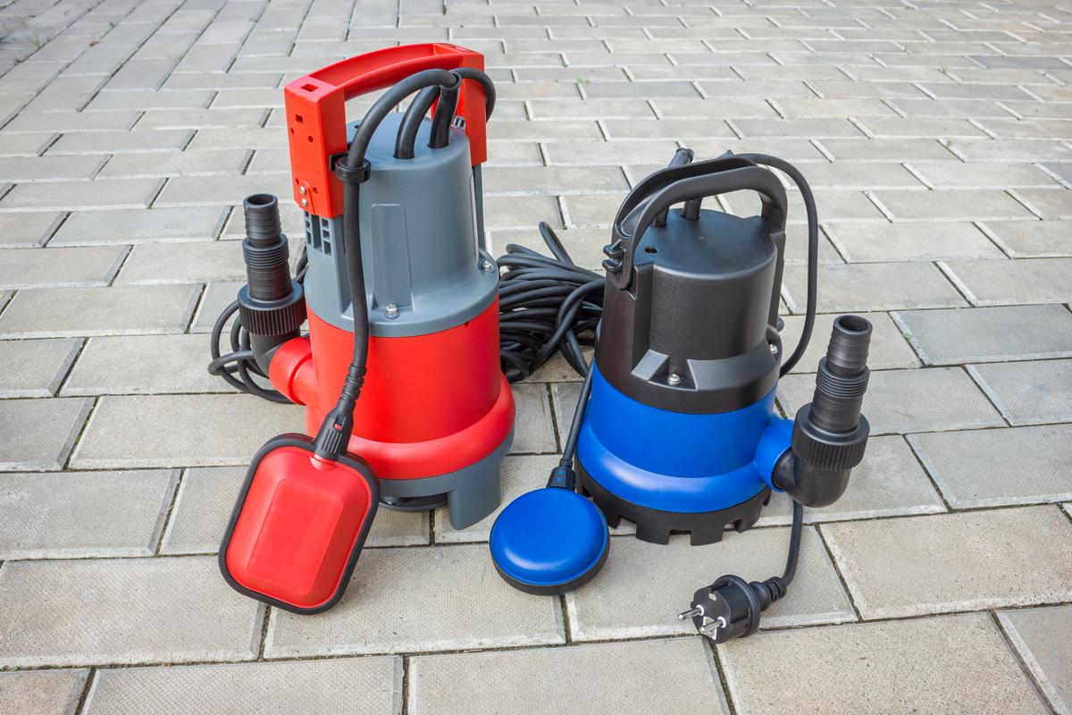 A sump pump diligently works in the basement, safeguarding the home from potential flooding by redirecting excess water to a designated drainage area.