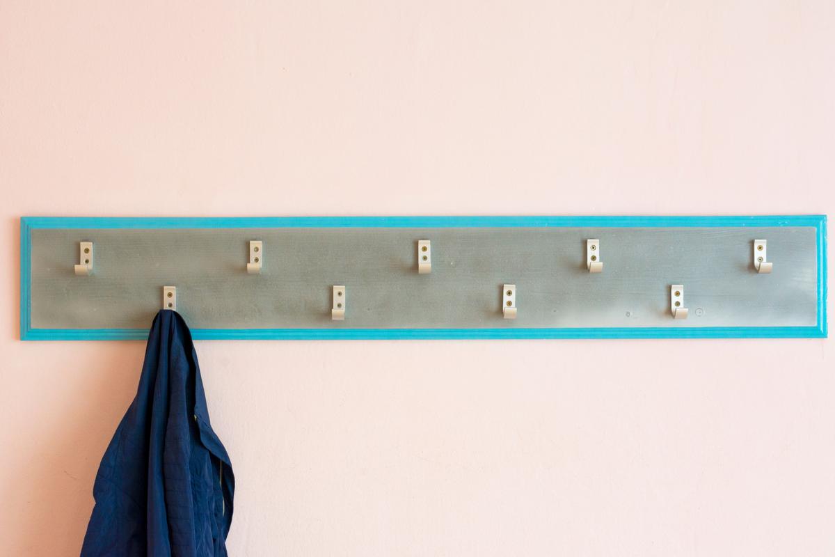 The Sturdy Convenience of a Single Plank Coat Rack