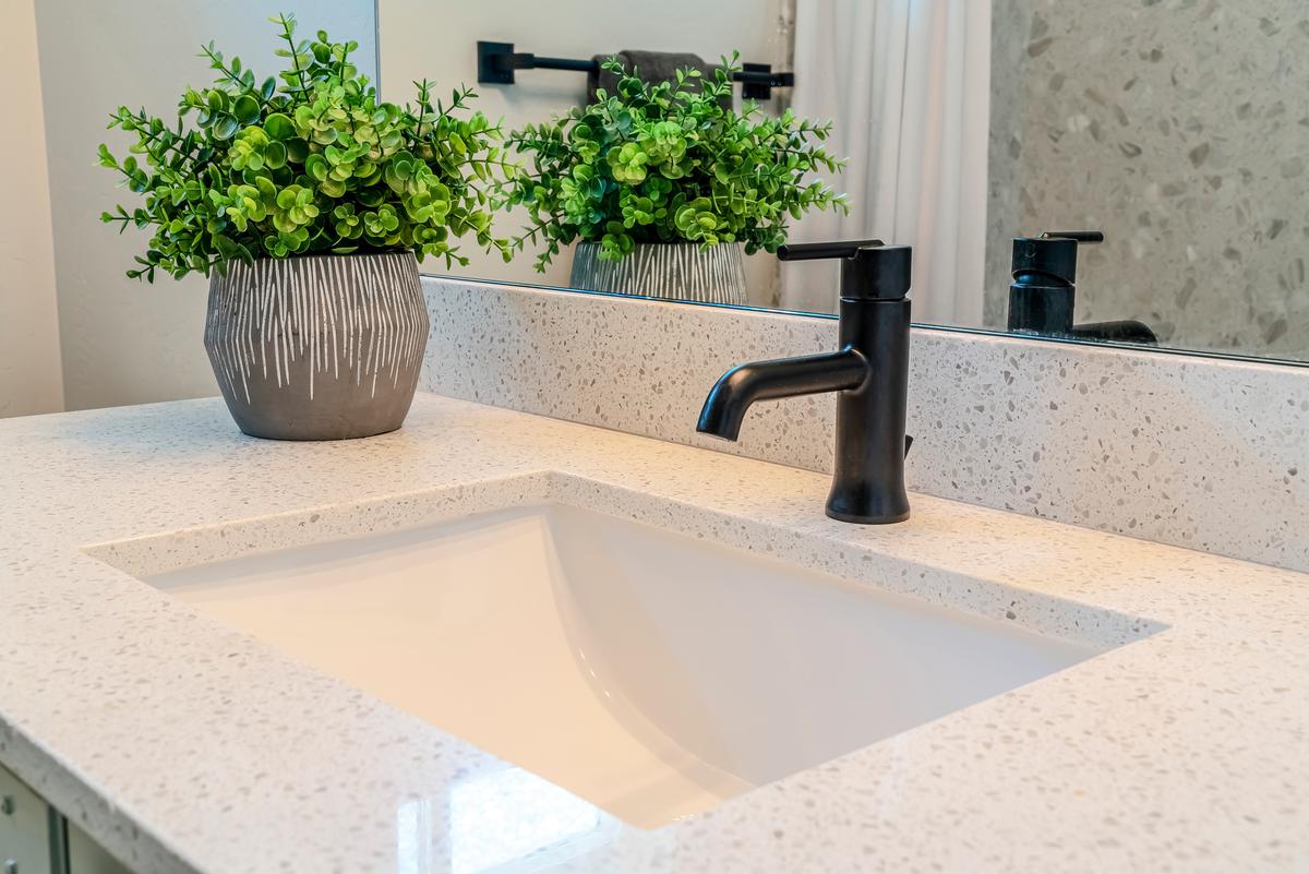 Undermmount basins are popular in kitchens and bathrooms alike, and offer a lot of counter space.