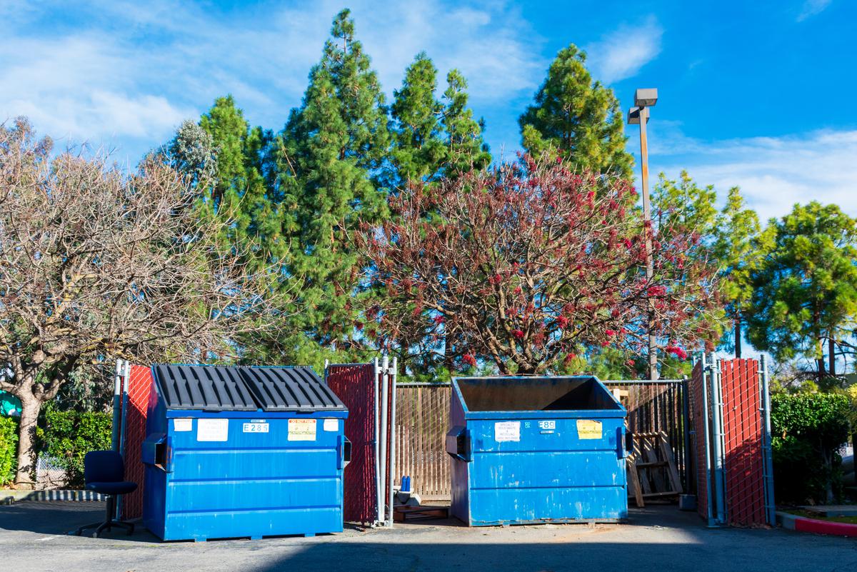What are backload dumpsters?