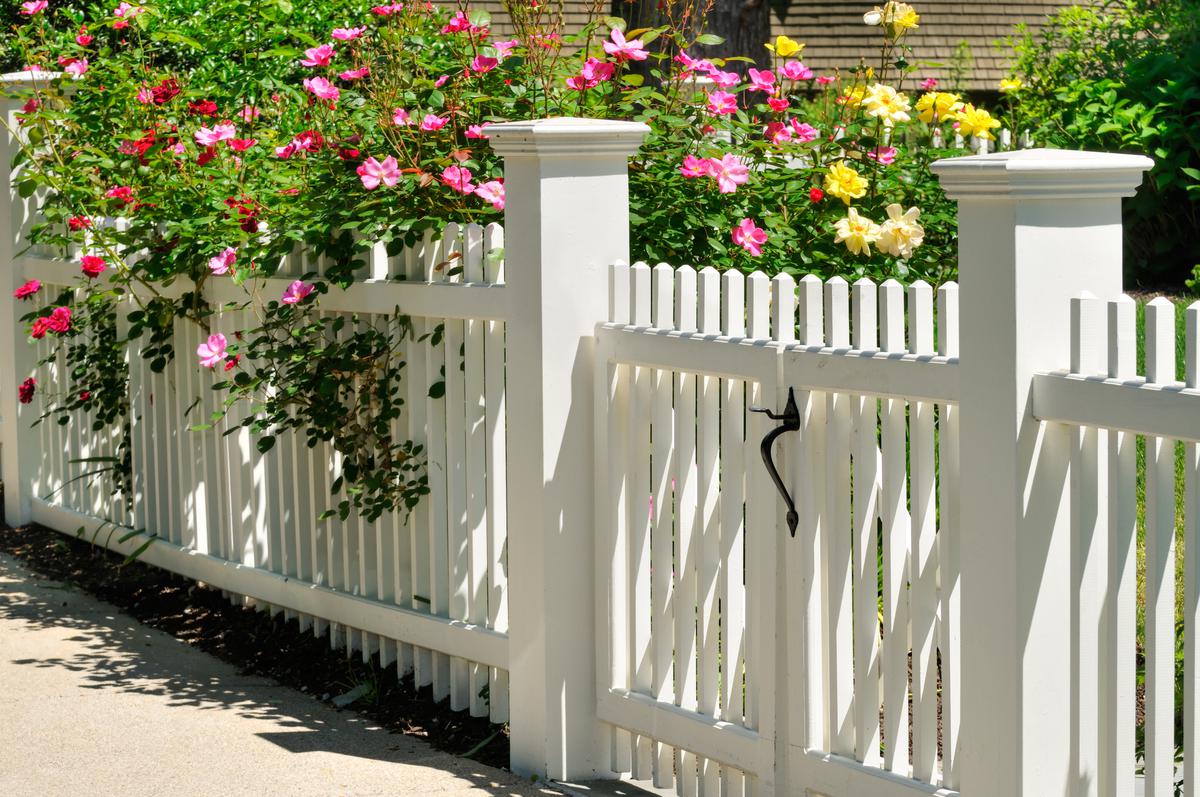 If you don't want to compromise the style of the fence,  landscaping can be a great option.