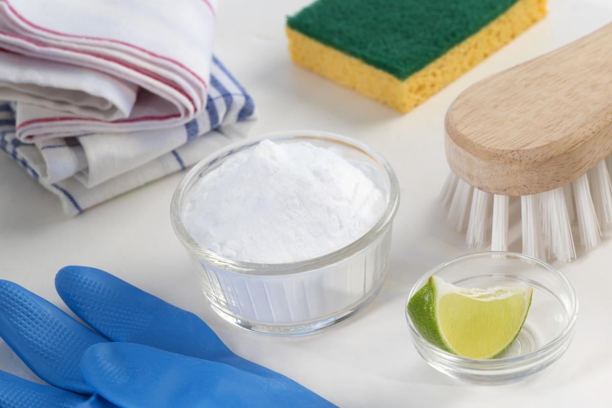 Combine bleach and baking soda in a container for a stronger cleaning solution.