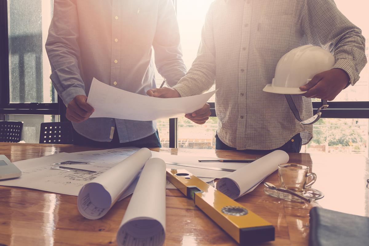 contractors working on blueprints