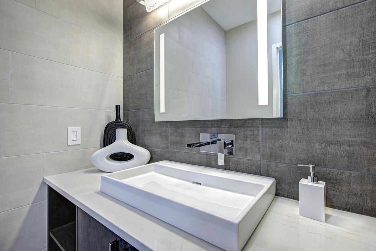 Mirrors with integrated lamps serve as an innovative solution to vanity lighting.