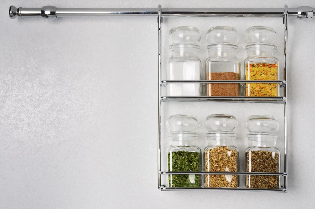 Hanging steel spice racks are great for kitchens with limited space.