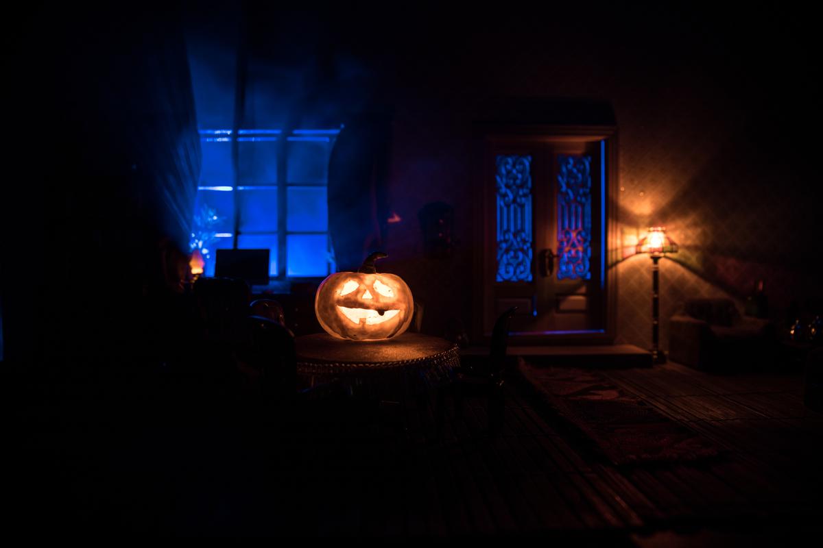 Give your home an eerie orangey glow with Halloween lighting that gives Christmas setups a run for their money.