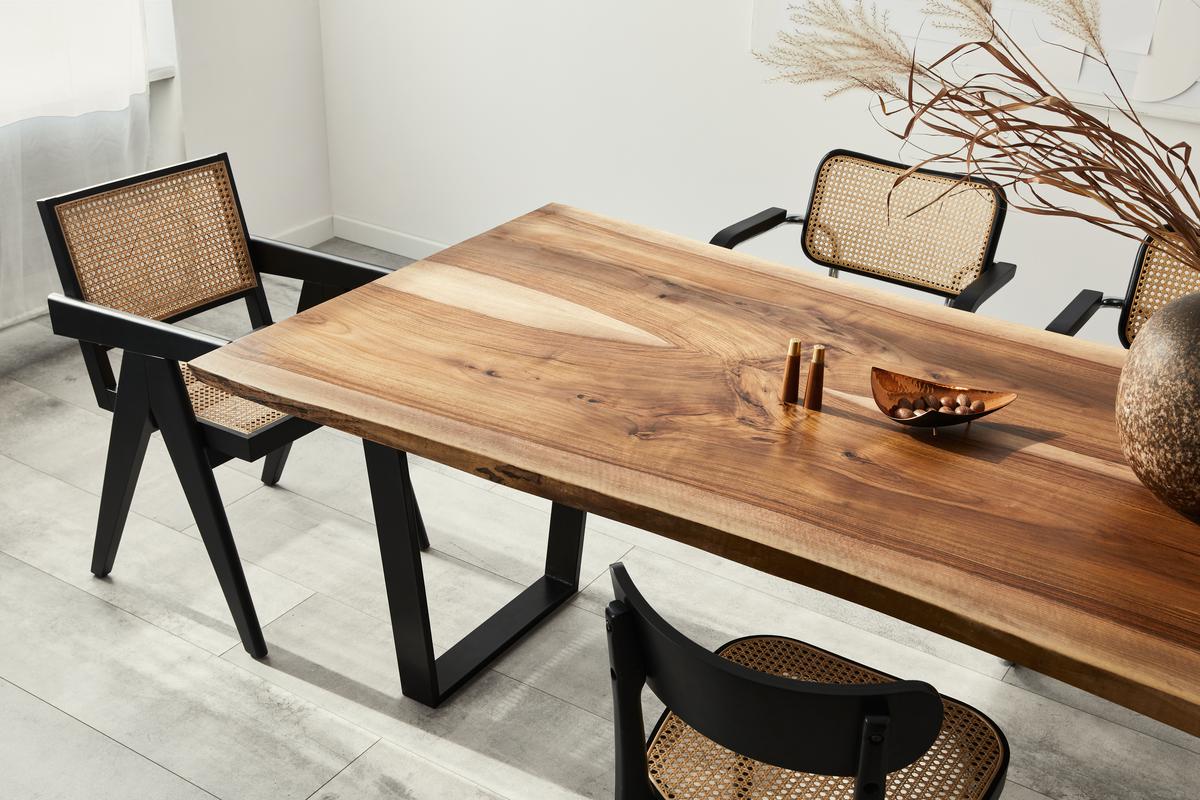Elevate your dining room design with a timeless hardwood table.