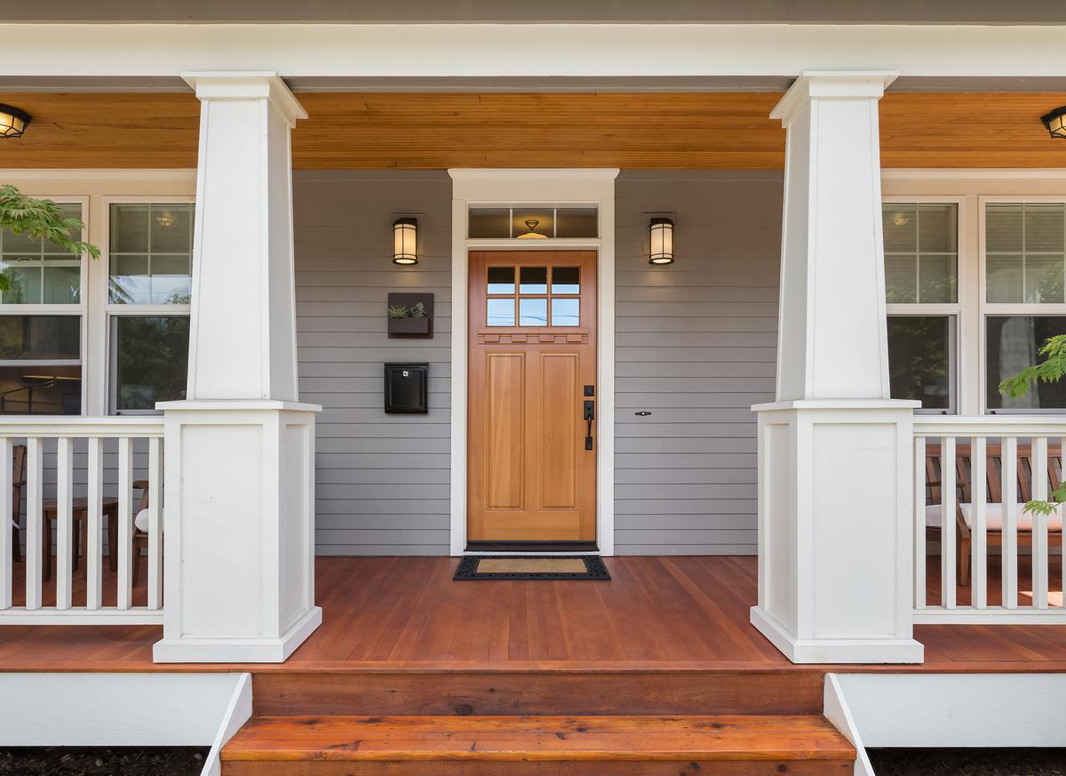 A farmhouse-style door trim frame makes for a very cool rustic effect.