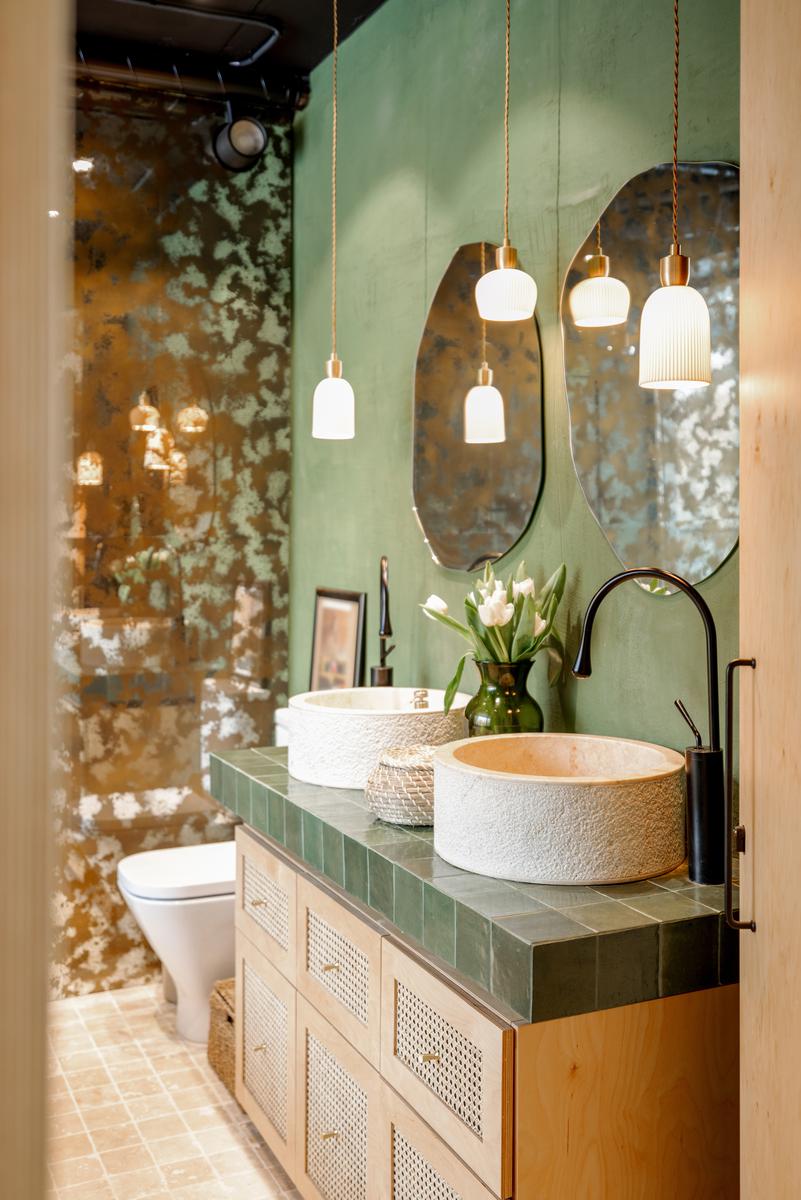 Use light wall colors along with accent colors in the room to add depth to a small space.
