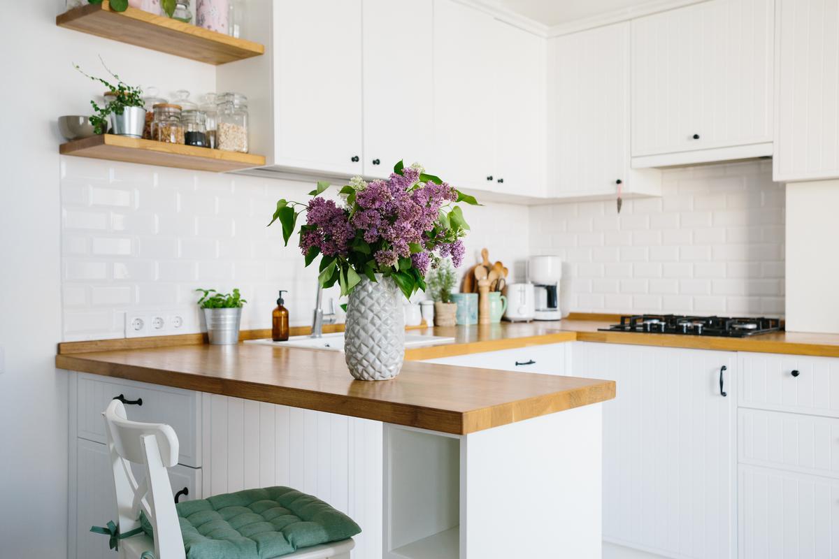 Make full use of vertical space with storage that reaches up to the ceiling.